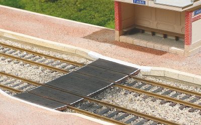 Comment faire un quai voyageurs ancien avec passage planchéié ?