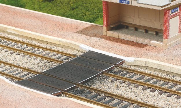 Comment faire un quai voyageurs ancien avec passage planchéié ?